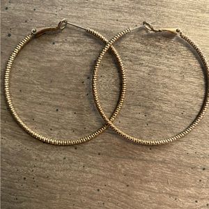 Gold hoop earrings, never worn